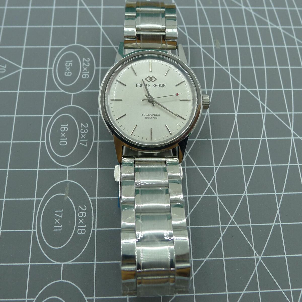 Beijing 36mm manual mechanical watch with silver case and silver nail indices, classic design for watch enthusiasts