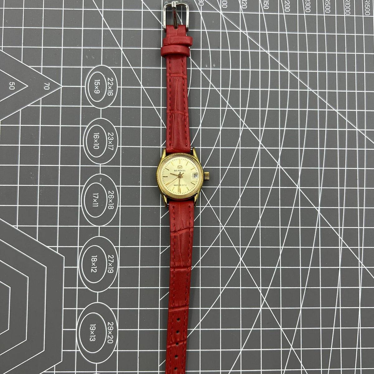 Golden dial Seagull lady watch with 19 jewels, manual mechanical movement, made in Tianjin factory, China.