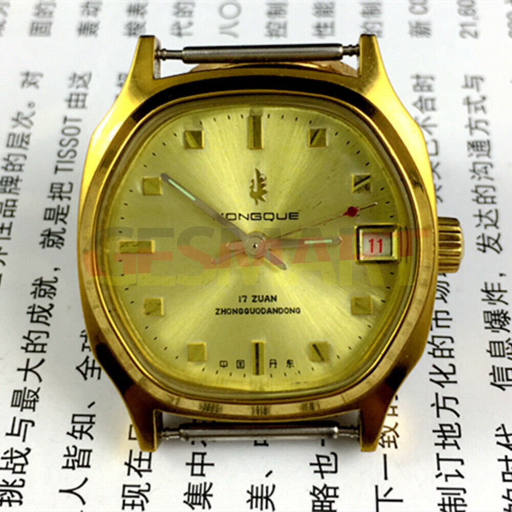 Old Stock Dandong manual mechanical watch with 17 jewels, single calendar, and elegant golden dial.