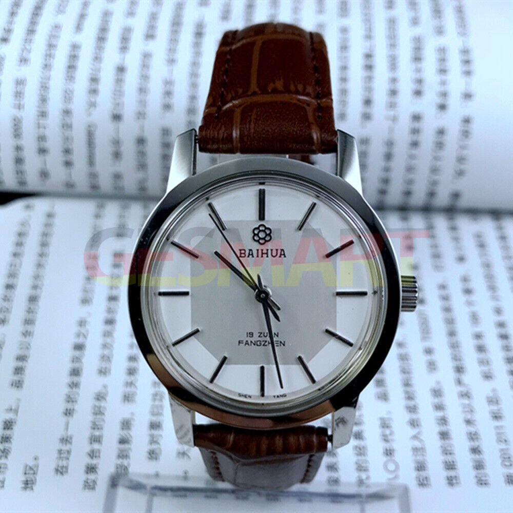 China Baihua 37mm manual mechanical watch with silver dial, 19 jewels, and shock-resistant design.