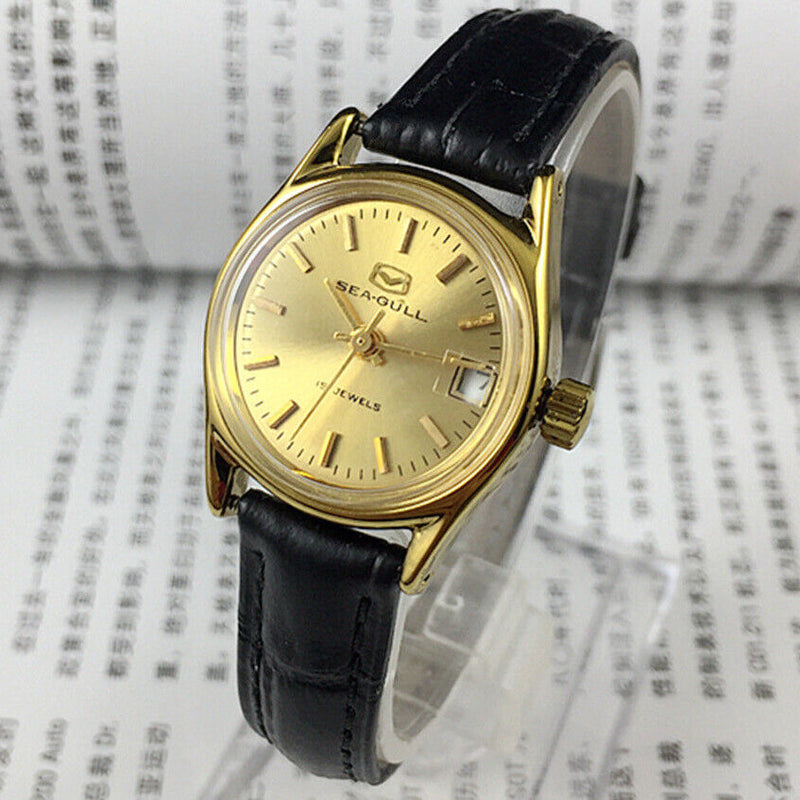 Golden dial Seagull Lady Watch with 19 jewels, manual mechanical movement from Tianjin Factory, elegant design.