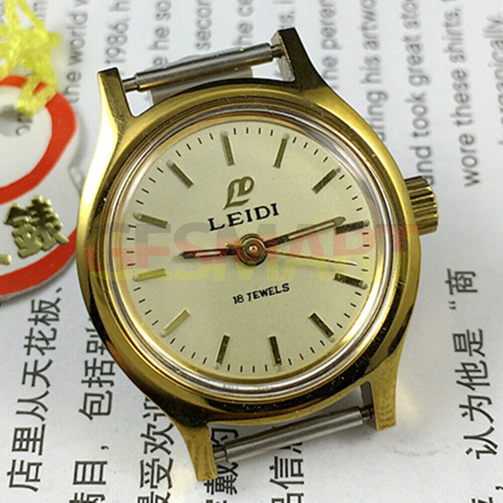 Leidi 27mm steel manual mechanical lady watch with 18 jewels and golden dial, paired with matching watch band.