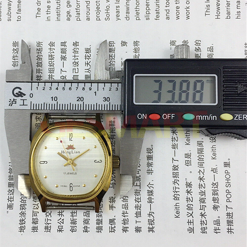 33mm HONGLIAN manual watch with gold numeral markers and square gold case, elegant accessory for daily wear.