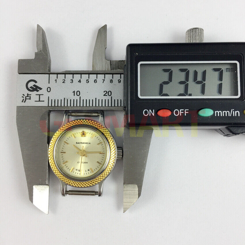 Shanghai Manual Lady Watch with golden nails and yellow dial, round case, 17 jewels, elegant design by Shanghai.