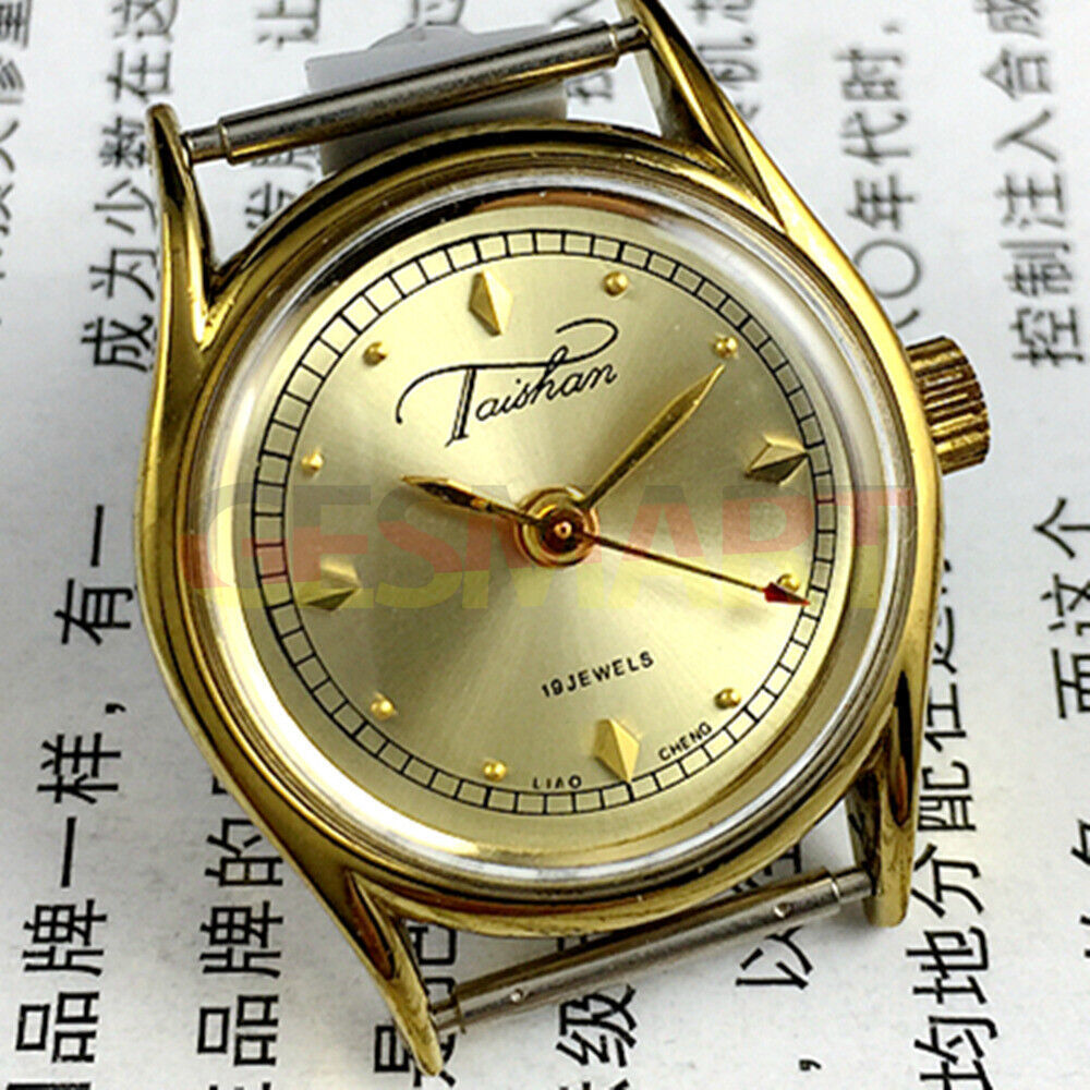Liaocheng TAISHAN lady watch with 19 jewels, golden nail markers, and elegant gold-tone case for stylish wear.