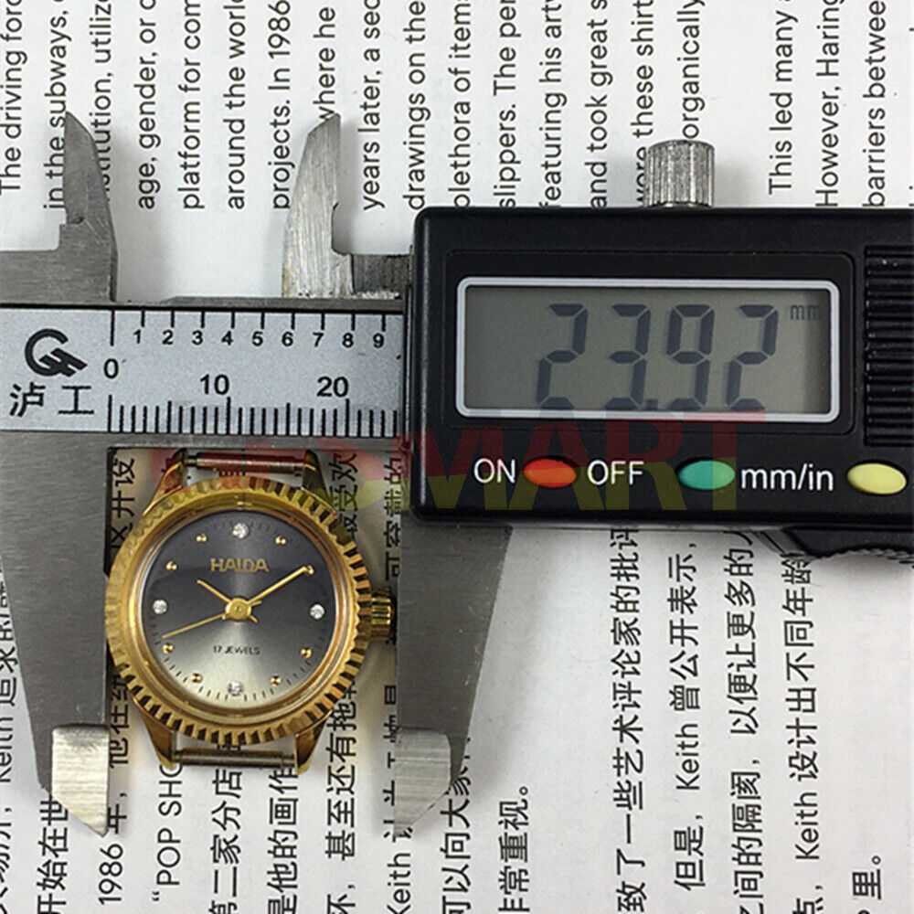 24mm SHANGHAI HAIDA ladies watch with manual mechanical movement, 17 jewels, and diamond-accented dial.