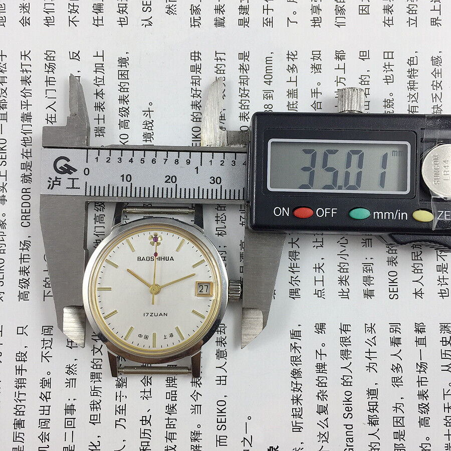 33mm Shanghai manual mechanical watch with single calendar, 17 jewels, shock-resistant design by Shanghai.