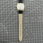 Black Dandong mechanical watch with 17 jewels, single calendar, and gold dial for timeless style.