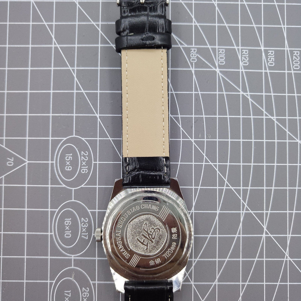 Shanghai Factory 38mm manual mechanical watch with white dial, 3 hands, 19 jewels, classic design by Shanghai Factory.