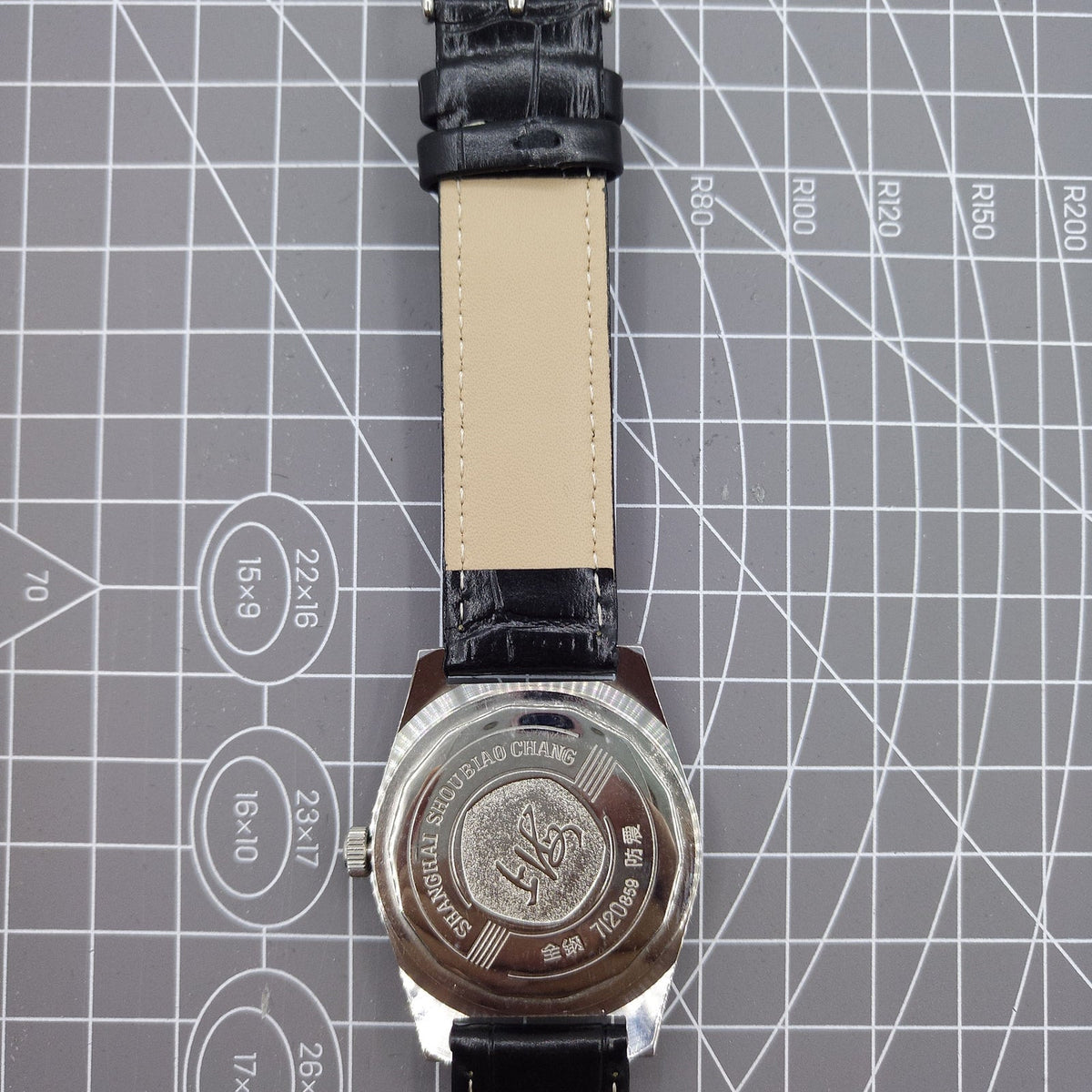 Shanghai Factory 38mm manual mechanical watch with white dial, 3 hands, 19 jewels, classic design by Shanghai Factory.