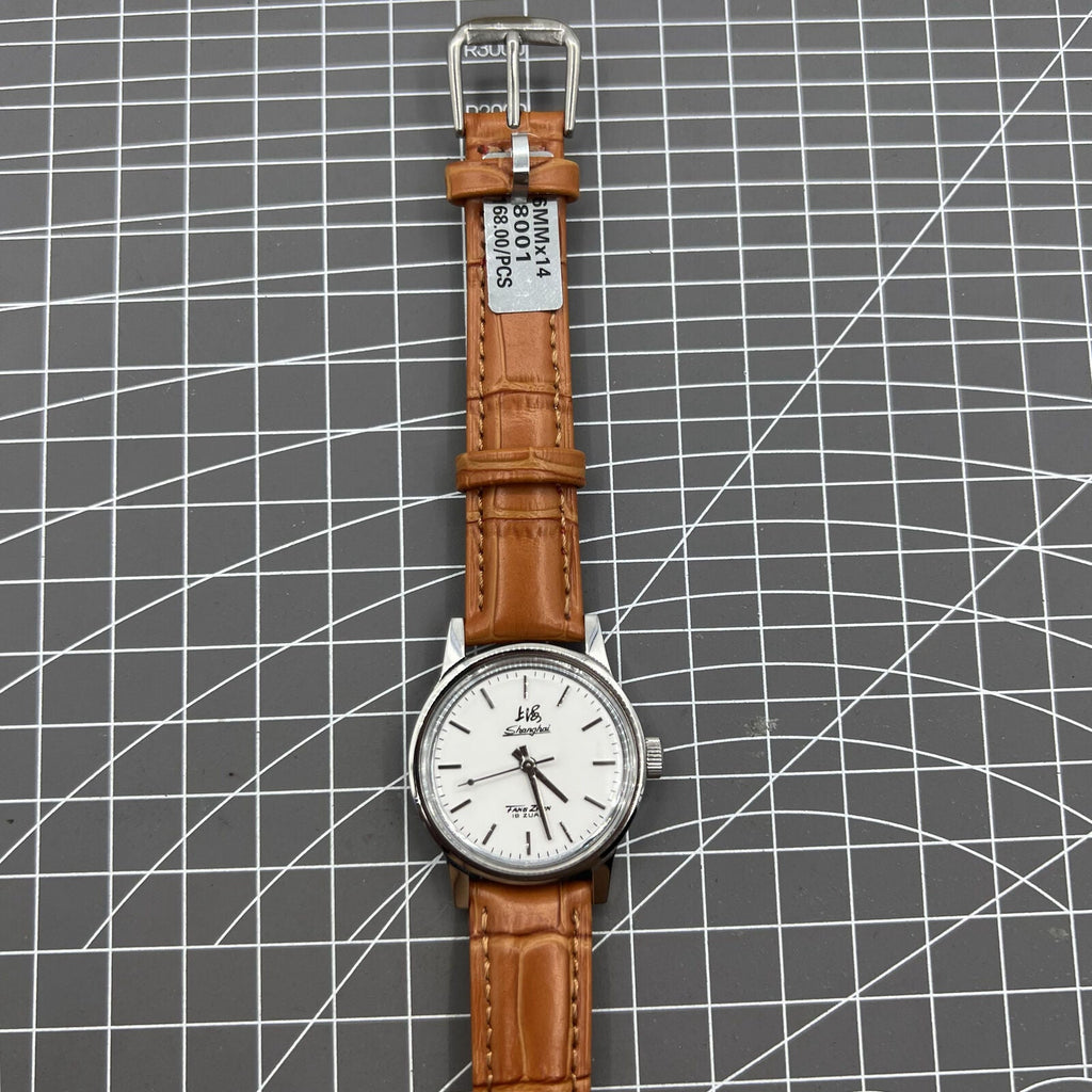 Shanghai Factory 32mm manual mechanical watch with 19 jewels, shock-resistant, classic timepiece design.