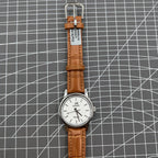 Shanghai Factory 32mm manual mechanical watch with 19 jewels, shock-resistant, classic timepiece design.