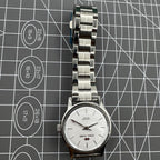 Beijing 31mm manual mechanical watch with silver case and three hands, classic China-made timepiece.