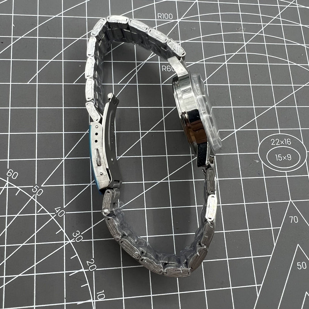 Silver 32mm Shanghai Factory manual mechanical watch with 19 jewels, classic shock-resistant timepiece.