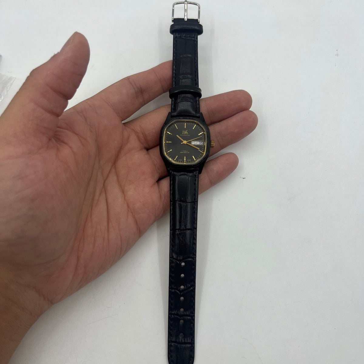 33mm Shanghai Factory manual mechanical watch with double calendar, black dial, classic design.
