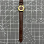 Brown 26mm Liaocheng TAISHAN manual mechanical lady watch featuring 19 jewels and elegant golden nail hour markers.