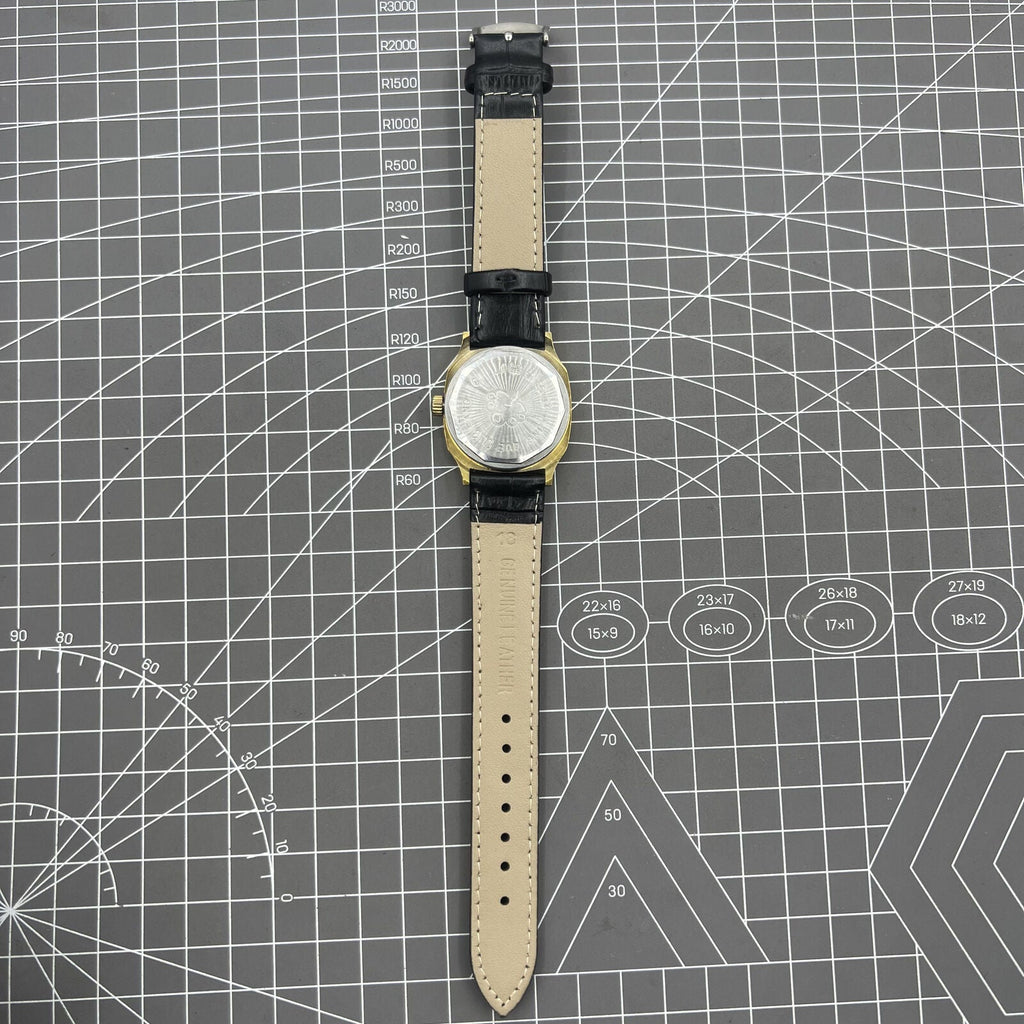 Black Dandong manual mechanical watch with 17 jewels, golden dial, single calendar for refined classic style.