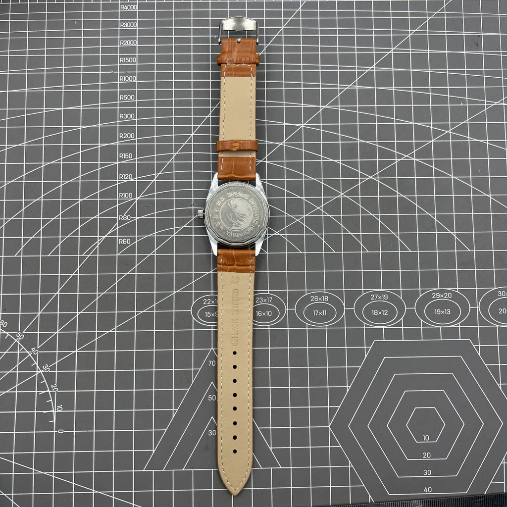 TAIHANG 38mm manual mechanical watch with silver dial, golden nails, round case, 17 jewels for classic style.