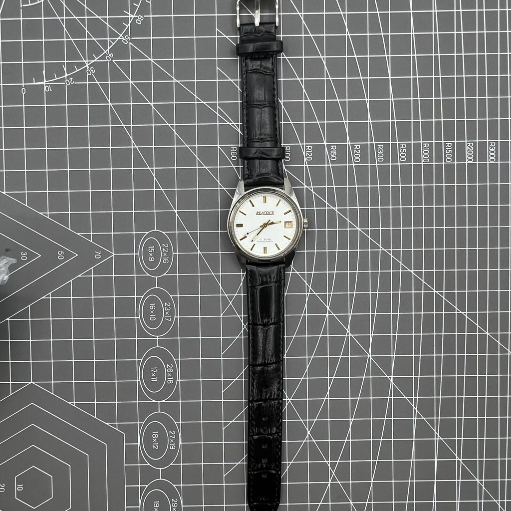 Liaoning Factory Made Peacock mechanical watch with 17 jewels, shock-resistant design for durability.
