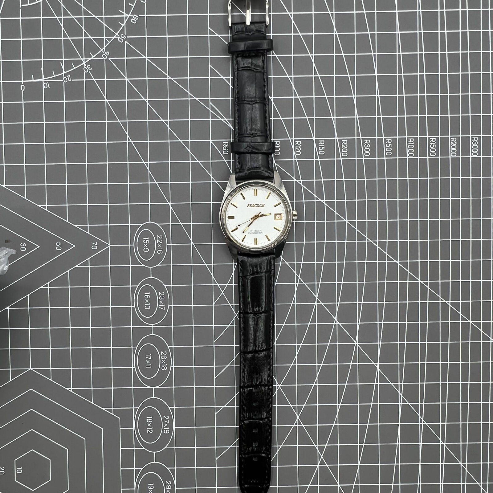 Liaoning Factory Made Peacock mechanical watch with 17 jewels, shock-resistant design for durability.