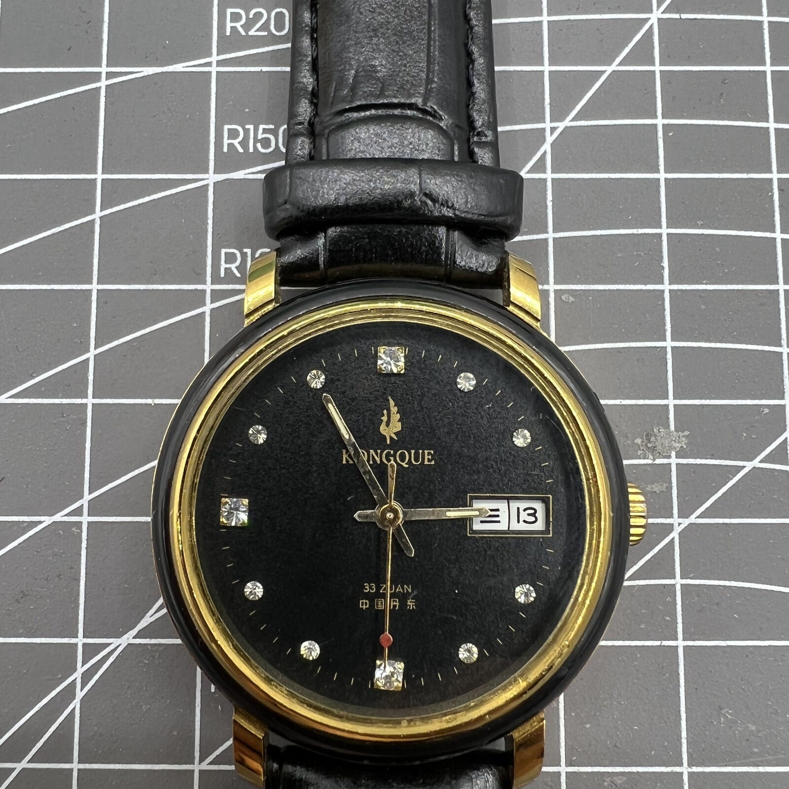 Kongque 37mm automatic watch with black dial, double calendar, 33 jewels, elegant design for stylish wear.