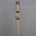 33mm Shanghai watch with blue dial, golden nail markers, square case, manual movement by Shanghai brand.