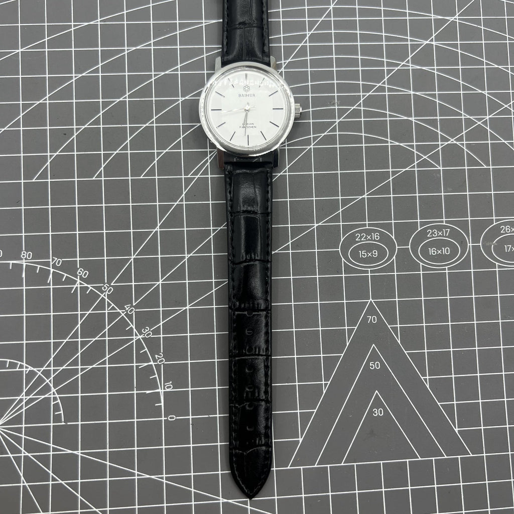 37mm China Baihua manual watch with 19 jewels, silver dial, shock-resistant for durable style.
