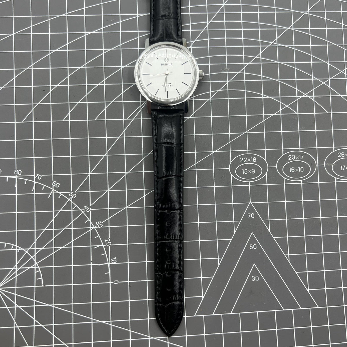 37mm China Baihua manual watch with 19 jewels, silver dial, shock-resistant for durable style.