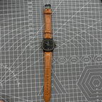 34mm Shanghai Factory manual mechanical watch with black dial, 19 jewels, and shock-resistant design.