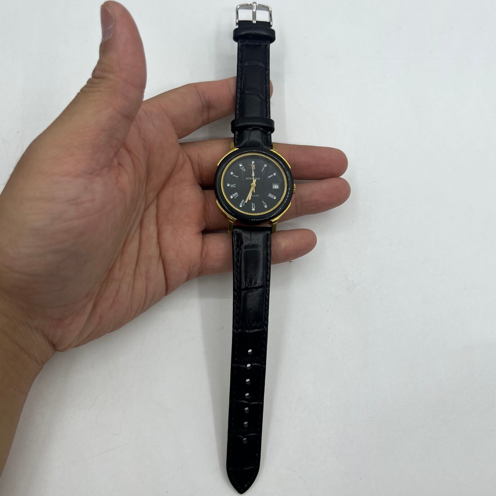 37mm Kongque automatic watch with black dial, Roman numerals, 33 jewels, precision timekeeping.