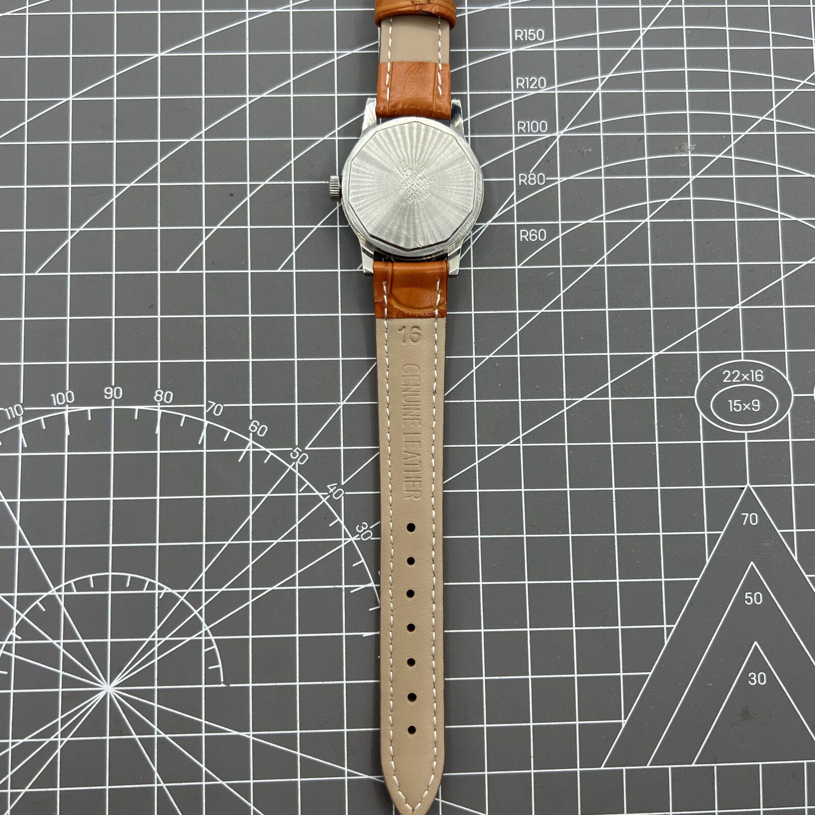 Shanghai Factory 32mm manual mechanical watch with 19 jewels, shock-resistant design, classic elegance.