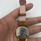 32mm Shanghai manual mechanical watch with golden markers, brown dial, and octagonal case design.
