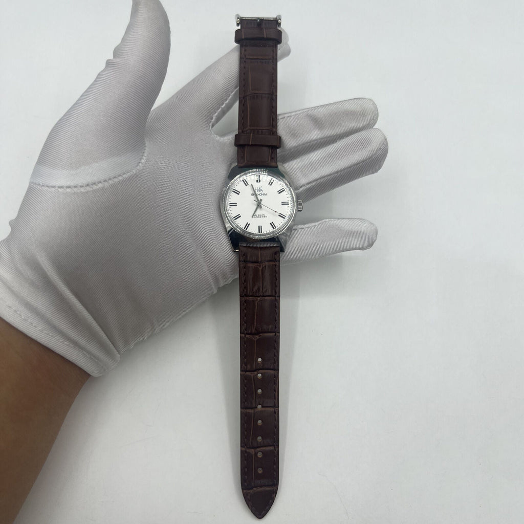 Shanghai Factory 38mm manual mechanical watch with white dial, 3 hands, 19 jewels for precise timekeeping.