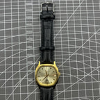 Black Dandong manual mechanical watch with 17 jewels, single calendar, and golden dial for classic elegance.