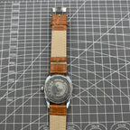 TAIHANG 38mm manual mechanical watch with silver dial, golden nails, round case, and 17 jewels for classic style.