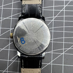 Shanghai Factory 34mm manual watch with black dial, 19 jewels, shock-resistant for durable timekeeping.