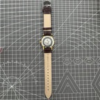 Beijing Double Rhomb mechanical watch with golden case and silver nail markers, elegant classic style for formal wear.