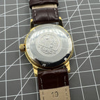 Beijing Double Rhomb mechanical watch, golden case, silver nail markers, elegant timeless design for formal wear