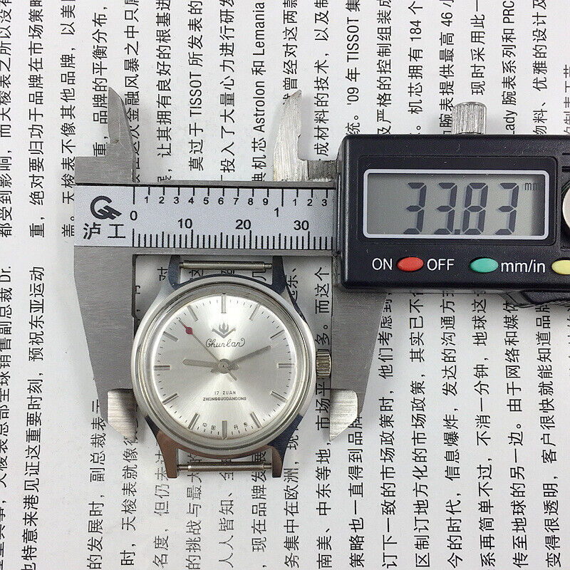 Chunlan 32mm light brown leather watch with silver dial, 17-jewel manual mechanical movement.