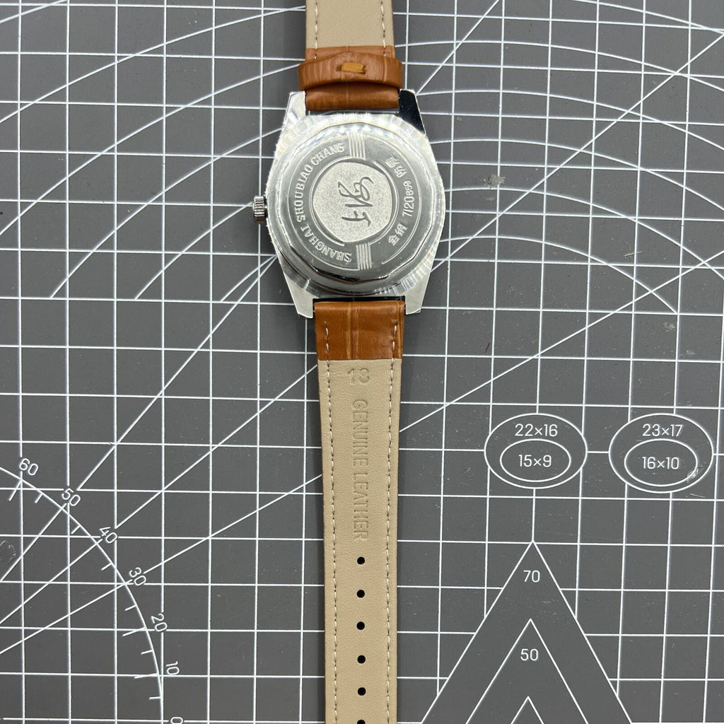 Shanghai Factory 7120 men's 37mm manual mechanical watch featuring shock-resistant movement and classic design for elegant style.
