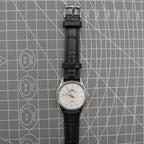 Silver 31mm Beijing Double Rhomb manual watch with three hands, elegant design for classic style.