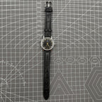 Taihang 32mm manual mechanical watch with black dial, golden nail markers, 17 jewels precision.