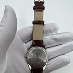 HONGLIAN 32mm manual mechanical watch with 17 jewels and Roman numerals in elegant classic design.