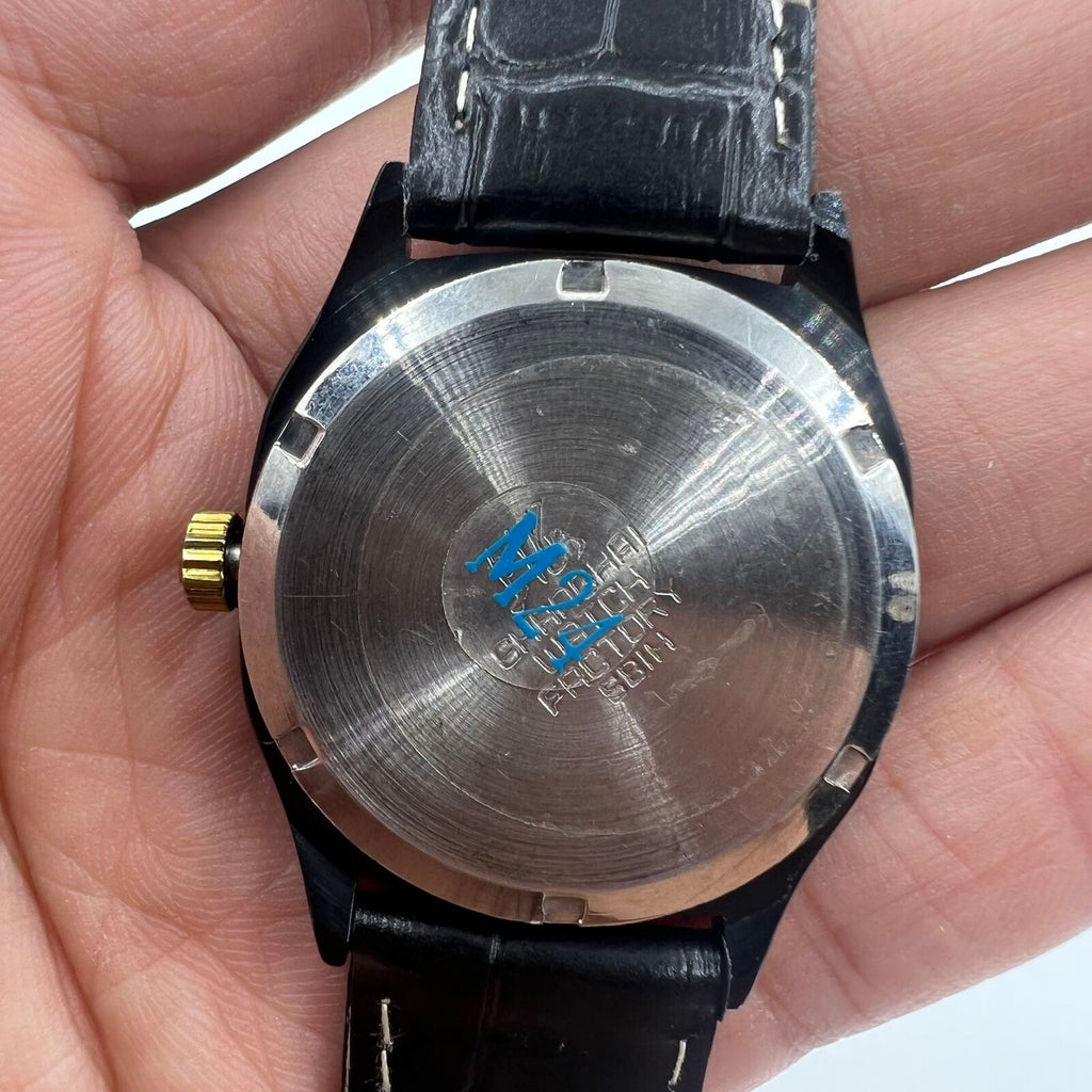 33mm Shanghai Factory manual watch with double calendar, black dial, elegant classic design for daily wear.