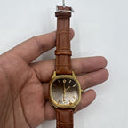 32mm Shanghai manual mechanical watch with golden indices, brown dial, and octagonal stainless steel case.