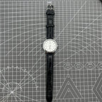 37mm Baihua manual mechanical watch with silver dial, 19 jewels, shock-resistant design for durability.
