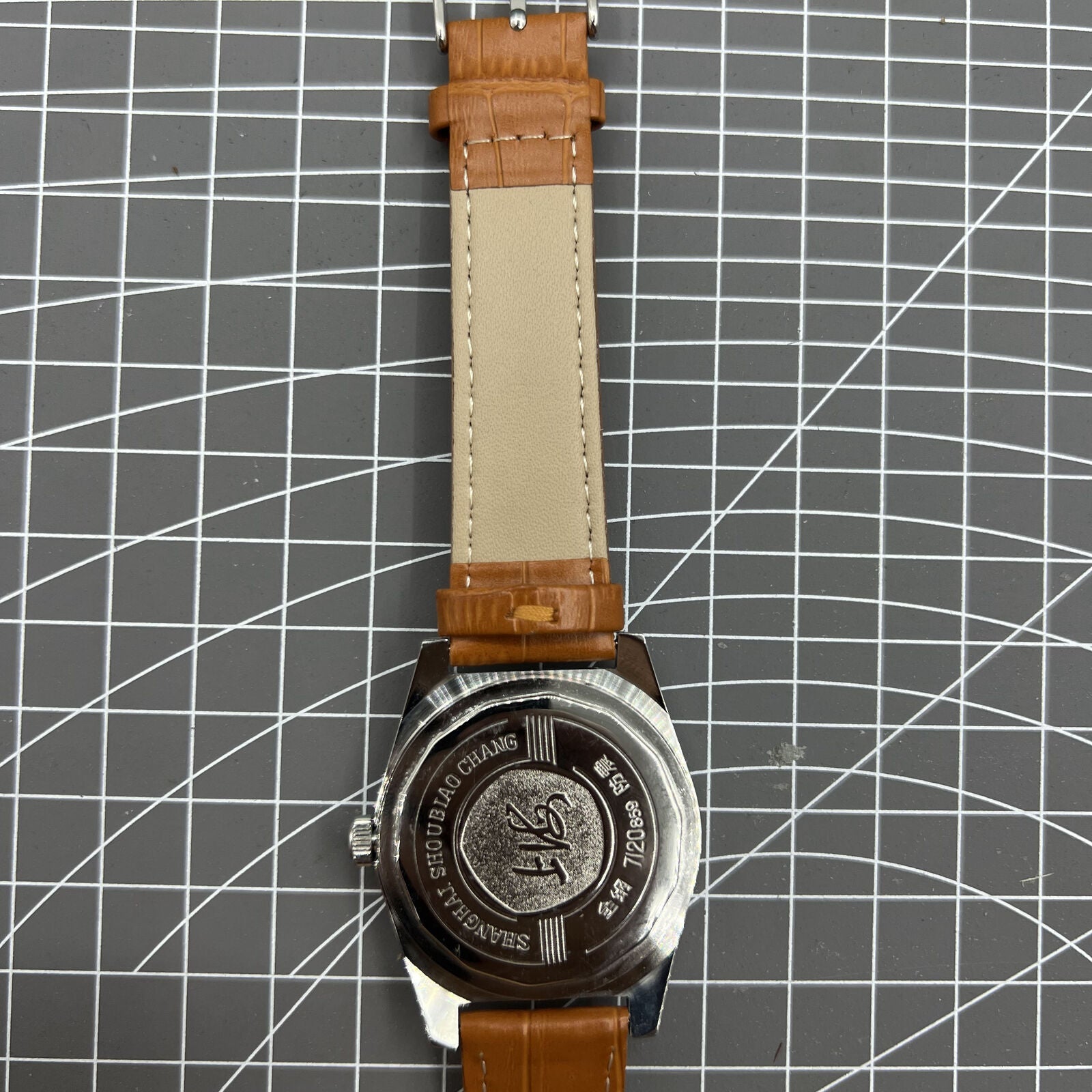 Shanghai Factory 7120 men's 37mm manual mechanical watch with shock-resistant movement and classic dial design.
