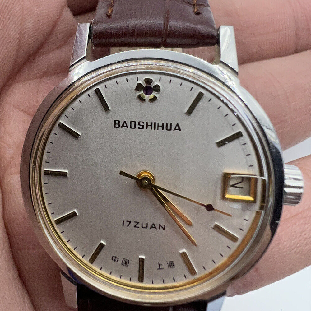 33mm Shanghai manual mechanical watch with single calendar, 17 jewels, shock-resistant design by Shanghai.