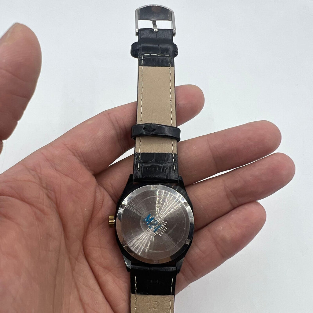 33mm Shanghai Factory manual watch with black dial, double calendar, and classic mechanical design.