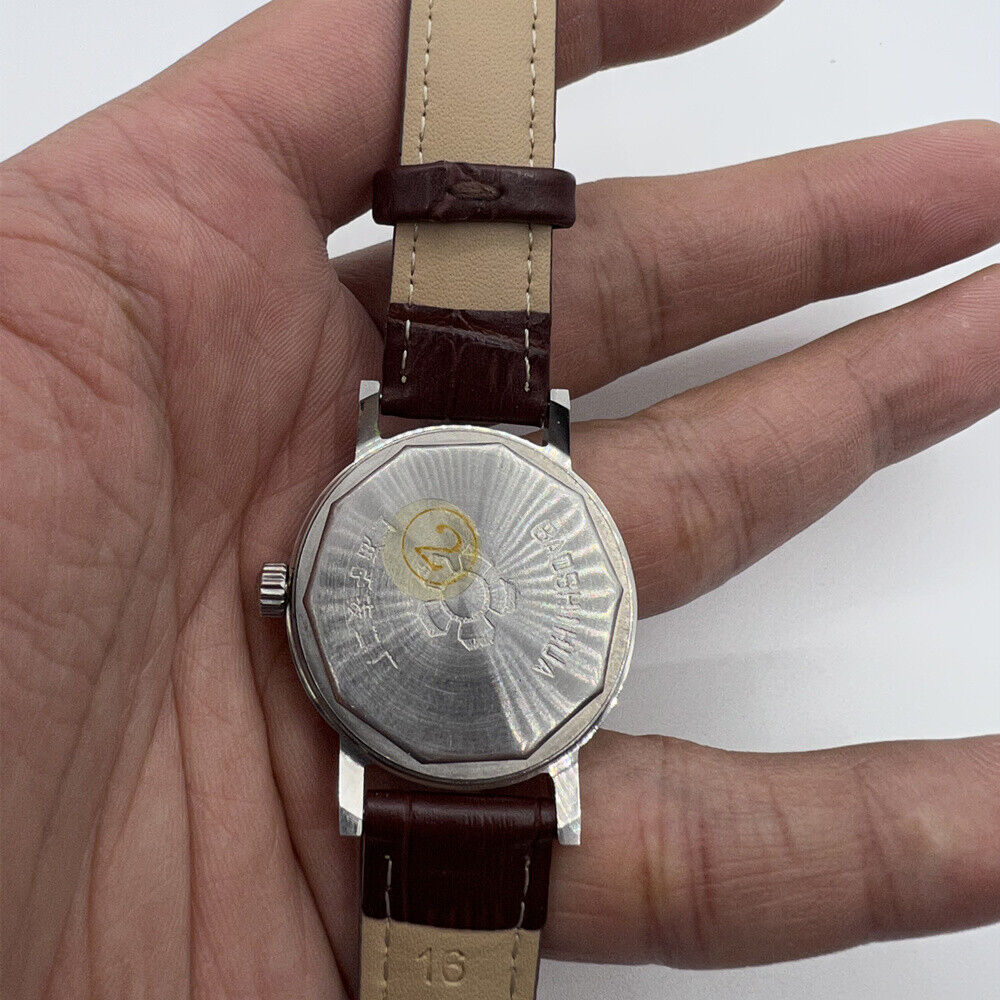 33mm Shanghai manual mechanical watch with single calendar, 17 jewels, shock-resistant design.